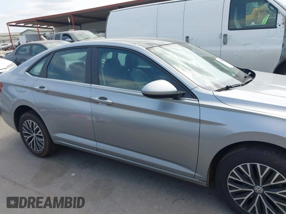 2020 Volkswagen Jetta S z VIN 3VWCB7BU1LM005223, wystawiony jako IAAI lot #42055485 z przebiegiem 48 270 mil mil oraz . Historia ofert i sprzedaży dostępna na DreamBid. Obrazek 13.