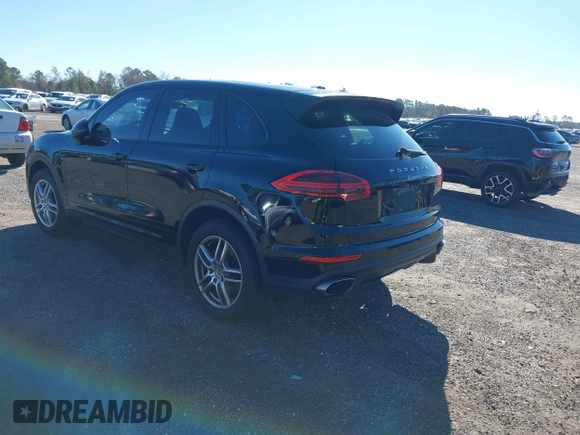 2016 Porsche Cayenne with VIN WP1AA2A21GLA02456, listed as a IAAI auction lot 41309026 with 136,266 mi miles. Bid and sale history available at carsss.com. Image 3.