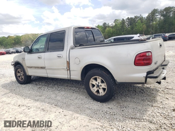 2002 Ford F-150 XLT with VIN 1FTRW07L12KA11845, listed as a Copart auction lot 51987205 with 282,865 mi miles and Salvage Title. Bid and sale history available at carsss.com. Image 2.