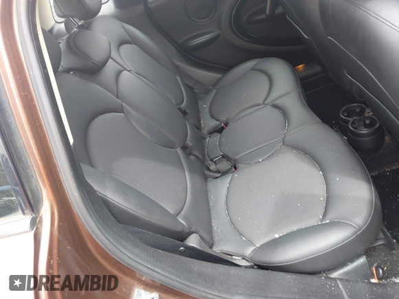 2014 MINI Countryman with VIN WMWZB3C51EWR36737, listed as a IAAI auction lot 41741248 with 69,717 mi miles and . Bid and sale history available at DreamBid. Image 8.