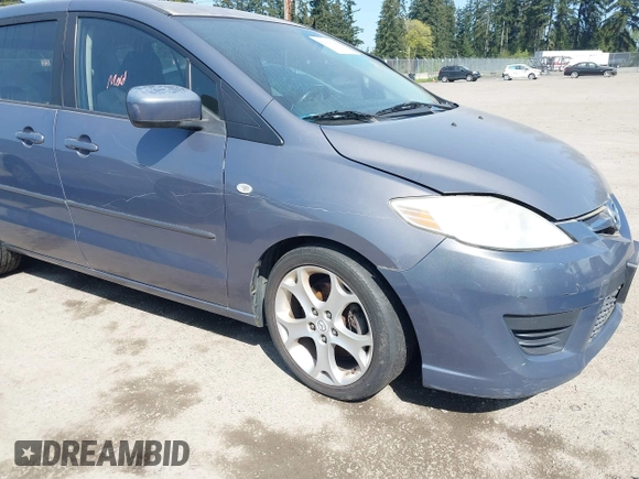 2009 Mazda Mazda5 Sport with VIN JM1CR293890352218, listed as a IAAI auction lot 42121590 with 168,302 mi miles. Bid and sale history available at carsss.com. Image 6.