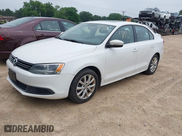 2014 Volkswagen Jetta SE with VIN 3VWD17AJ0EM371501, listed as a IAAI auction lot 42597170 with 166,686 mi miles and . Bid and sale history available at DreamBid. Image 2.