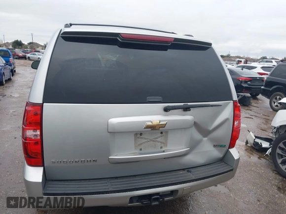2011 Chevrolet Suburban LS with VIN 1GNSCHE06BR188407, listed as a IAAI auction lot 41453215 with 232,667 mi miles. Bid and sale history available at carsss.com. Image 16.