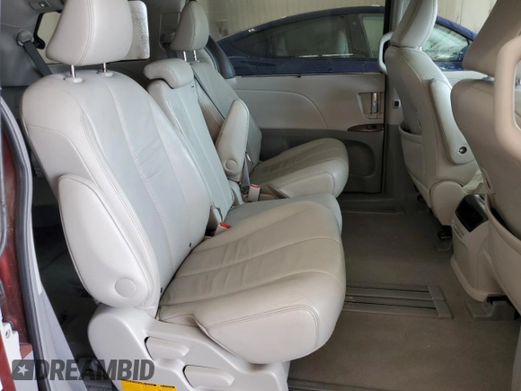 2011 Toyota Sienna XLE AAS with VIN 5TDYK3DC8BS024209, listed as a Copart auction lot 58923715 with 134,051 mi miles and Salvage title. Bid and sale history available at DreamBid. Image 11.