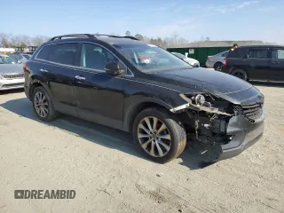 2015 Mazda CX-9 Grand Touring with VIN JM3TB2DA1F0457499, listed as a Copart auction lot 44647895 with 216,229 mi miles and Clean Title. Bid and sale history available at DreamBid. Image 4.