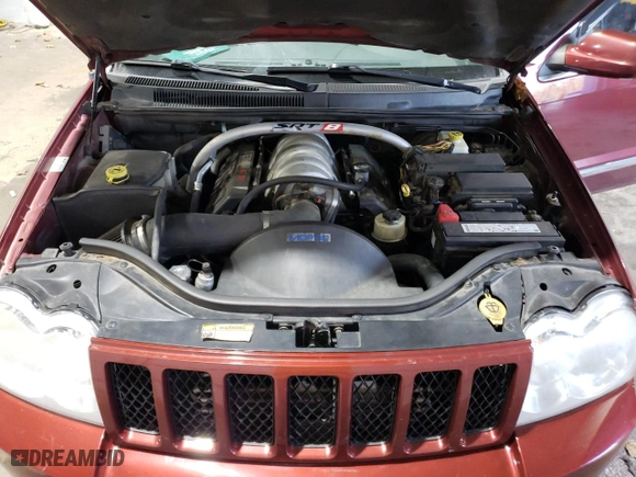 2007 Jeep Grand Cherokee SRT-8 with VIN 1J8HR78357C509051, listed as a Copart auction lot 79013524 with 161,580 mi miles and Salvage Title. Bid and sale history available at carsss.com. Image 12.