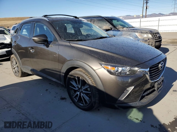 2017 Mazda CX-3 Touring with VIN JM1DKFC76H0168549, listed as a Copart auction lot 47499205 with 75,978 mi miles and Salvage Title. Bid and sale history available at carsss.com. Image 4.