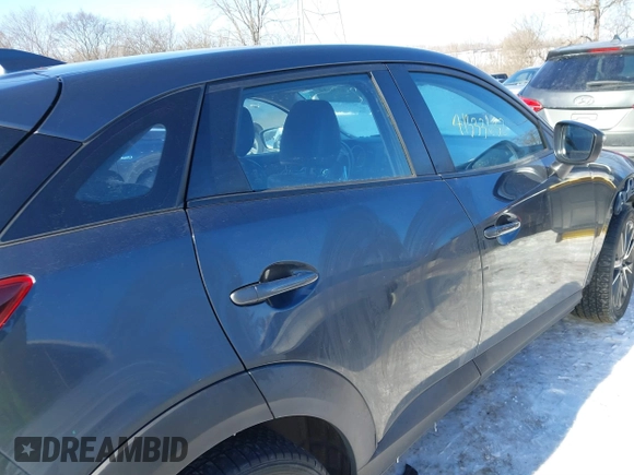 2017 Mazda CX-3 Touring with VIN JM1DKFC72H0167205, listed as a IAAI auction lot 41333632 with 106,063 mi miles. Bid and sale history available at carsss.com. Image 14.