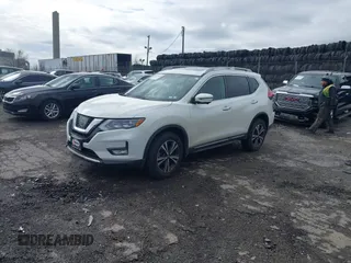 2017 Nissan Rogue SV with VIN 5N1AT2MV1HC830652, listed as a IAAI auction lot 41716845 with 126,599 mi miles. Bid and sale history available at carsss.com. Image 2.