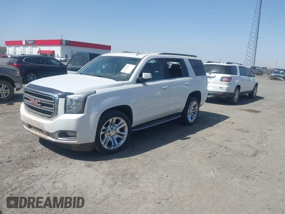 2017 GMC Yukon SLT with VIN 1GKS1BKC9HR278190, listed as a IAAI auction lot 41824213 with 104,323 mi miles. Bid and sale history available at carsss.com. Image 2.