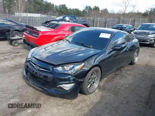 2013 Hyundai Genesis Coupe 2.0T z VIN KMHHT6KD2DU097886, wystawiony jako IAAI lot #41864894 z przebiegiem 152 642 mil mil oraz . Historia ofert i sprzedaży dostępna na DreamBid. Obrazek 2.