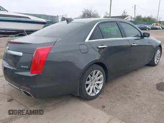 2015 Cadillac CTS AWD z VIN 1G6AW5SX6F0116891, wystawiony jako IAAI lot #42077259 z przebiegiem 119 426 mil mil oraz . Historia ofert i sprzedaży dostępna na DreamBid. Obrazek 4.