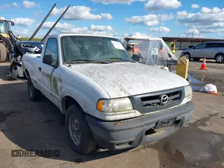 2002 Mazda B-Series 2WD Truck SX with VIN 4F4YR12D42TM18276, listed as a IAAI auction lot 41723184 with 142,623 mi miles. Bid and sale history available at carsss.com. Image 1.