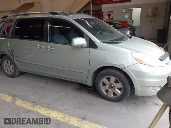 2007 Toyota Sienna XLE with VIN 5TDZK22C37S023719, listed as a IAAI auction lot 41566286 with 239,296 mi miles. Bid and sale history available at carsss.com. Image 1.