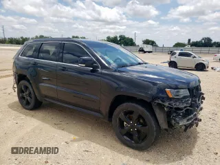 2016 Jeep Grand Cherokee Overland z VIN 1C4RJFCG8GC316271, wystawiony jako Copart lot #57245065 z przebiegiem 125 820 mil mil oraz Szkoda całkowita • Salvage title. Historia ofert i sprzedaży dostępna na DreamBid. Obrazek 4.