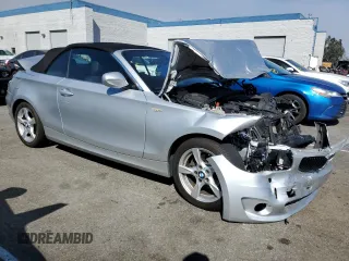 2013 BMW 1 Series 128i z VIN WBAUN1C55DVR01242, wystawiony jako Copart lot #71388854 z przebiegiem 35 350 mil mil oraz Szkoda całkowita • Salvage title. Historia ofert i sprzedaży dostępna na DreamBid. Obrazek 4.
