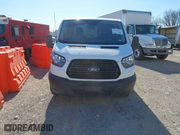 2019 Ford Transit with VIN 1FTYE1YM7KKA11022, listed as a IAAI auction lot 41790533 with 212,997 mi miles. Bid and sale history available at carsss.com. Image 12.