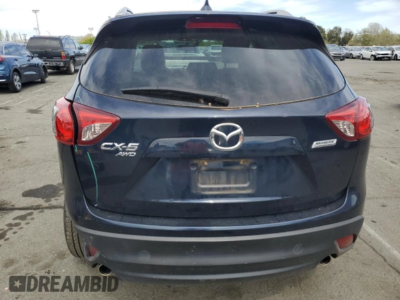 2016 Mazda CX-5 Grand Touring with VIN JM3KE4DY4G0750939, listed as a Copart auction lot 52727395 with 72,428 mi miles and Salvage Title. Bid and sale history available at carsss.com. Image 6.