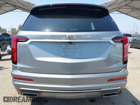 2023 Cadillac XT6 FWD Premium Luxury with VIN 1GYKPCRS6PZ163018, listed as a IAAI auction lot 42437403 with 21,366 mi miles and . Bid and sale history available at DreamBid. Image 17.