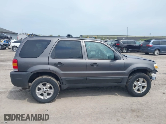 2005 Ford Escape XLT with VIN 1FMYU03115KB16214, listed as a IAAI auction lot 42113350 with 79,355 mi miles and . Bid and sale history available at DreamBid. Image 13.