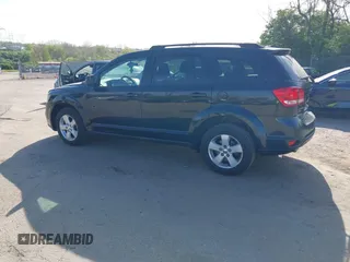 2012 Dodge Journey SXT with VIN 3C4PDDBGXCT160348, listed as a IAAI auction lot 42096075 with 135,095 mi miles and . Bid and sale history available at DreamBid. Image 3.