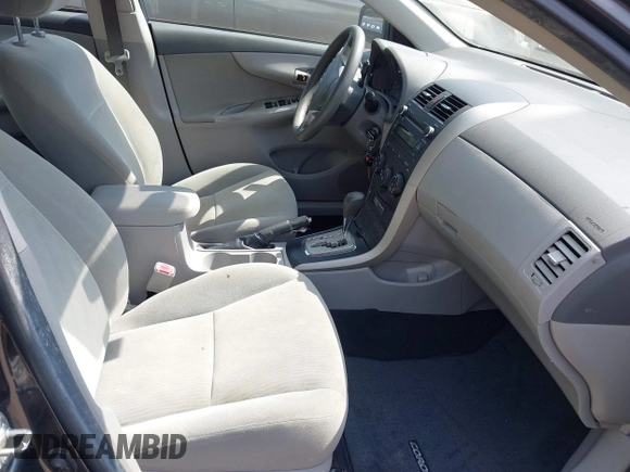 2010 Toyota Corolla with VIN 1NXBU4EE5AZ371315, listed as a IAAI auction lot 42159130 with 371,048 mi miles and . Bid and sale history available at carsss.com. Image 5.