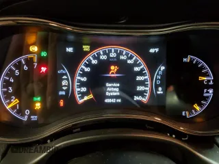 2021 Jeep Grand Cherokee 80th Anniversary z VIN 1C4RJFBG3MC701752, wystawiony jako Copart lot #52396005 z przebiegiem 45 842 mil mil oraz Szkoda całkowita • Salvage title. Historia ofert i sprzedaży dostępna na DreamBid. Obrazek 9.