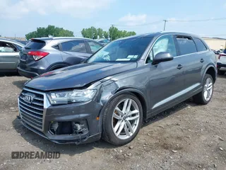 2018 Audi Q7 Prestige with VIN WA1VAAF75JD036199, listed as a IAAI auction lot 42557507 with 104,644 mi miles and . Bid and sale history available at DreamBid. Image 19.