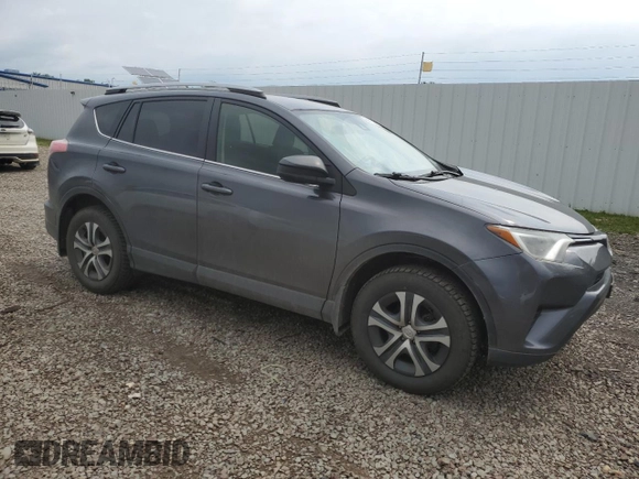 2017 Toyota RAV4 LE z VIN JTMBFREV3HJ118680, wystawiony jako Copart lot #60592805 z przebiegiem 213 787 mil mil oraz Szkoda całkowita • Salvage title. Historia ofert i sprzedaży dostępna na DreamBid. Obrazek 4.