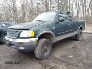 2001 Ford F-150 XL with VIN 1FTRX18LX1NA33311, listed as a IAAI auction lot 41940094 with 202,534 mi miles. Bid and sale history available at carsss.com. Image 2.