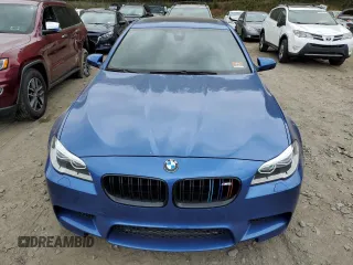 2014 BMW M5 z VIN WBSFV9C5XED097563, wystawiony jako Copart lot #72175354 z przebiegiem 73 406 mil mil oraz Szkody całkowita. Historia ofert i sprzedaży dostępna na DreamBid. Obrazek 5.