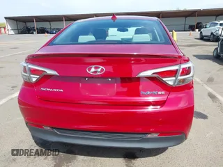 2016 Hyundai Sonata Hybrid SE with VIN KMHE24L18GA026079, listed as a IAAI auction lot 42051741 with 116,076 mi miles. Bid and sale history available at carsss.com. Image 16.