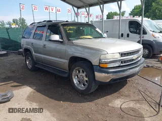 2003 Chevrolet Tahoe LS z VIN 1GNEK13Z93J261682, wystawiony jako IAAI lot #42618420 z przebiegiem 211 463 mil mil oraz . Historia ofert i sprzedaży dostępna na DreamBid. Obrazek 1.
