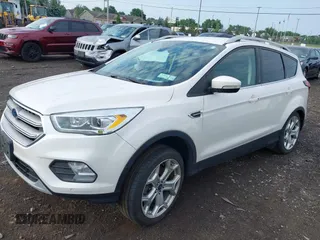 2019 Ford Escape Titanium with VIN 1FMCU9J97KUA03195, listed as a IAAI auction lot 42656589 with 40,099 mi miles and . Bid and sale history available at DreamBid. Image 2.