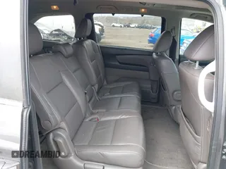 2013 Honda Odyssey EX-L with VIN 5FNRL5H63DB034963, listed as a IAAI auction lot 41921431 with 163,609 mi miles and . Bid and sale history available at DreamBid. Image 8.
