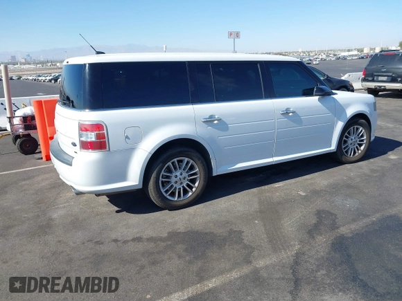 2016 Ford Flex SEL with VIN 2FMHK6C85GBA12635, listed as a IAAI auction lot 40715147 with 104,573 mi miles. Bid and sale history available at carsss.com. Image 4.