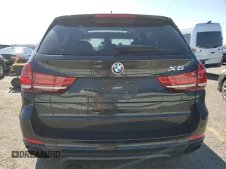 2016 BMW X5 xDrive50i with VIN 5UXKR6C59G0J81052, listed as a Copart auction lot 49572985 with 90,207 mi miles and Salvage Title. Bid and sale history available at carsss.com. Image 6.