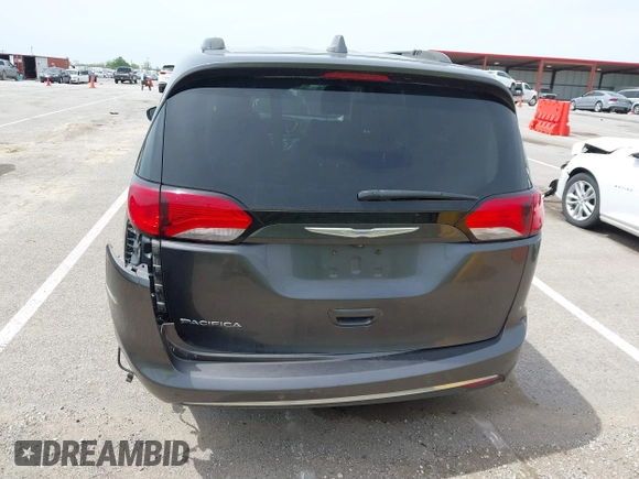 2017 Chrysler Pacifica Touring L with VIN 2C4RC1BG1HR540246, listed as a IAAI auction lot 42107768 with 151,268 mi miles and . Bid and sale history available at DreamBid. Image 16.