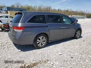 2016 Honda Odyssey EX-L with VIN 5FNRL5H61GB072390, listed as a Copart auction lot 54174445 with 149,088 mi miles and Salvage Title. Bid and sale history available at DreamBid. Image 3.