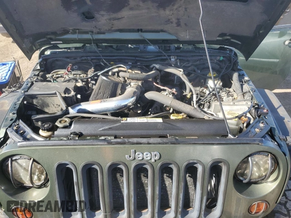 2008 Jeep Wrangler Sahara with VIN 1J4FA54178L653453, listed as a Copart auction lot 45490235 with 95,250 mi miles and Salvage title. Bid and sale history available at DreamBid. Image 12.