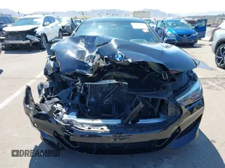 2022 BMW 8 Series 840i with VIN WBAGV2C06NCH71589, listed as a IAAI auction lot 41852263 with Not Provided miles and . Bid and sale history available at carsss.com. Image 6.
