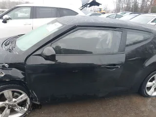 2012 Hyundai Veloster w/Black Int with VIN KMHTC6ADXCU024923, listed as a IAAI auction lot 41556793 with 101,923 mi miles and . Bid and sale history available at DreamBid. Image 14.