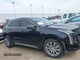2023 Cadillac XT4 FWD Premium Luxury with VIN 1GYFZCR4XPF101409, listed as a IAAI auction lot 41891293 with 29,355 mi miles and . Bid and sale history available at carsss.com. Image 14.
