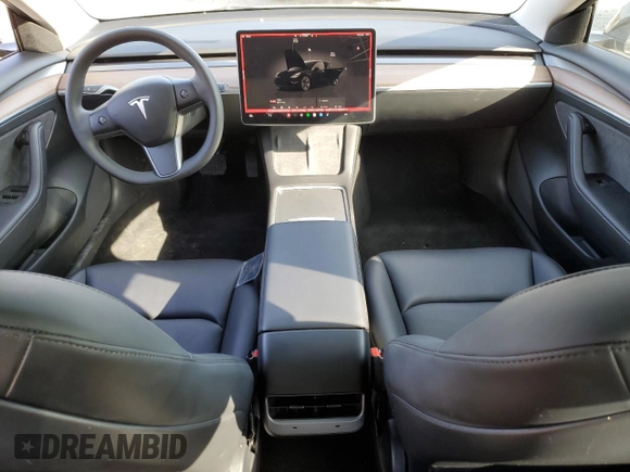 2023 Tesla Model 3 with VIN 5YJ3E1EA3PF670787, listed as a Copart auction lot 49070865 with 13,489 mi miles and Salvage title. Bid and sale history available at DreamBid. Image 8.
