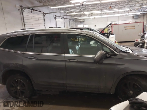 2016 Honda Pilot EX-L with VIN 5FNYF6H75GB104064, listed as a IAAI auction lot 41286959 with 106,263 mi miles. Bid and sale history available at carsss.com. Image 14.