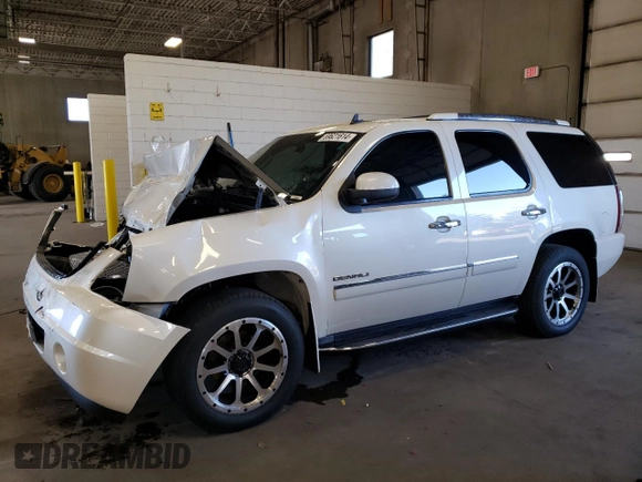 2012 GMC Yukon Denali with VIN 1GKS2EEF3CR140772, listed as a Copart auction lot 69621614 with 207,425 mi miles and Salvage Title. Bid and sale history available at carsss.com. Image 1.