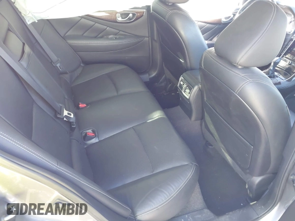 2015 Infiniti Q50 z VIN JN1BV7AR0FM397309, wystawiony jako IAAI lot #41752569 z przebiegiem 116 475 mil mil oraz . Historia ofert i sprzedaży dostępna na DreamBid. Obrazek 8.