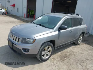 2016 Jeep Compass Sport with VIN 1C4NJDBB1GD566261, listed as a IAAI auction lot 42122853 with 212,060 mi miles. Bid and sale history available at carsss.com. Image 2.