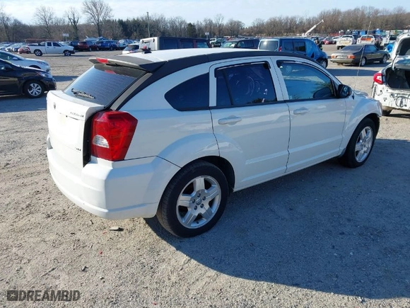 2009 Dodge Caliber SXT with VIN 1B3HB48A99D107704, listed as a IAAI auction lot 41742363 with 1 mi miles. Bid and sale history available at carsss.com. Image 4.