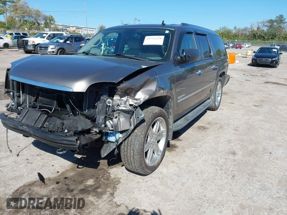 2011 GMC Yukon XL Denali with VIN 1GKS2MEF4BR280225, listed as a IAAI auction lot 41732220 with 121,684 mi miles. Bid and sale history available at carsss.com. Image 23.
